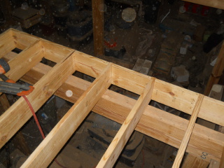 Full 2x10 Blocks Between Joists Over Second Beam