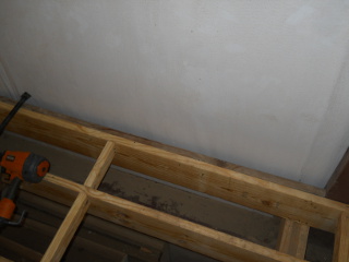 2x4 Attached to Extend Floor Parallel to the Joists