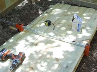 Bees 2012 Fourth Wall of Fenced Area with Clamp Over Fence Slats