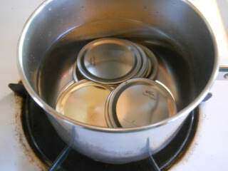 Canning Lids in Pot