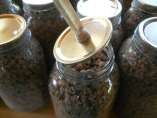 Placing Canning Lid on Jar