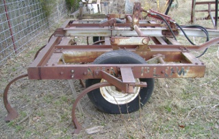 Side View of 9 Point Chisel Plow