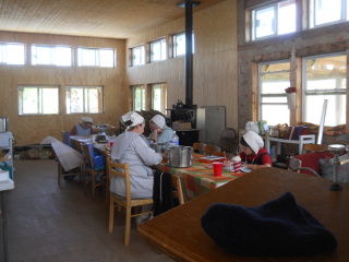 Ladies Processing Pumpkin & Sewing