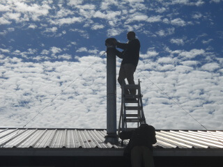 Putting Back On the Chimney Cap