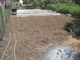 Mulching Over Raised Beds Area