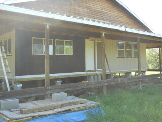 House West Side Lower Siding Half of the Siding Up