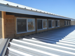 Cedar Fence Slat Siding Partially Done
