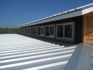 House Upper South Siding Window Frames in Place