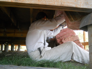 House Floor Installing Insulation