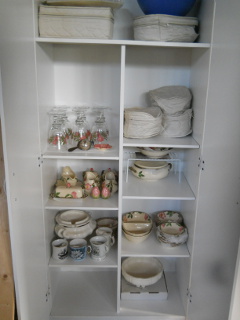 Grandmother's China Dishes in Kitchen Cabinet