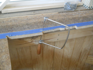 Coping Saw Cutting Back of Kitchen Sink Cutout