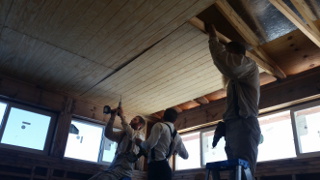 Putting Up Ceiling Panels in the House Library