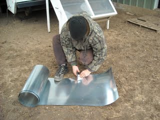 Cutting the Flashing for the Concrete Pier Homemade Termite Shield