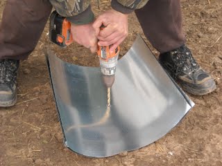 Drilling the Center Hole for the Concrete Pier Homemade Termite Shield