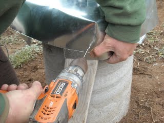 Drilling a Rivet Hole in the Concrete Pier Homemade Termite Shield