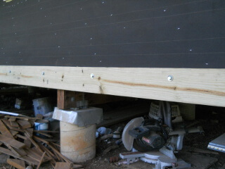 Porch Ledger Board Bolted to Joists