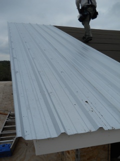 First Piece of Roofing Metal Installed