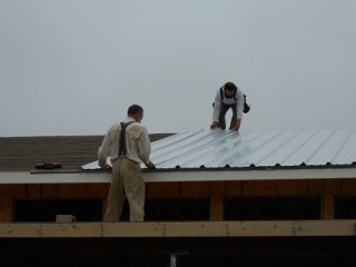 Placing the Roof Metal on the Roof