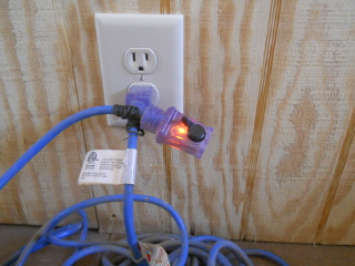 Extension Cord Inside Showing Power