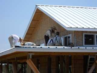 House Installing Pony Wall Windows from The Porch Roof