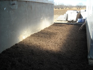 Landscaping Mulch Between Cistern and Summer Kitchen