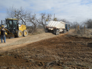Belly Dumper Dropping Road Base