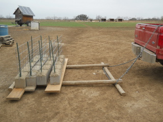 Pig fence sections on shack caddy
