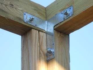 Inside Corner of Porch Cross Beams with T-Strap