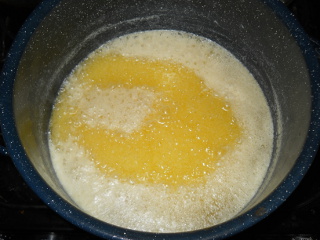 Dissipating Foam on Melted Butter