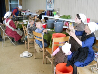 Spring Ranchfest 2012 Ladies and Children Helping Snap Mesquite Pods