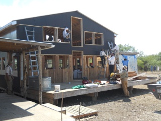 Ranchfest Men Working on the North Side of the Bunker Cottage