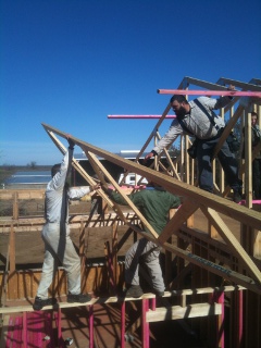 Hoisting Roof Truss into Position