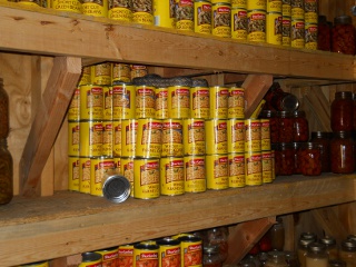 Root Cellar Snake on Cans