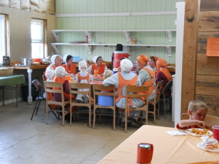 The Women Eating and Fellowshipping on The 12th Orange Day, 2012