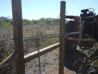 Tractor Pulling the Fence Straight