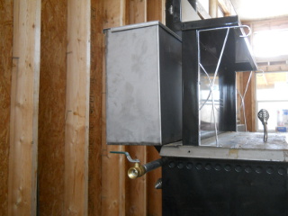 Wood Burning Stove Water Warming Tank in Place